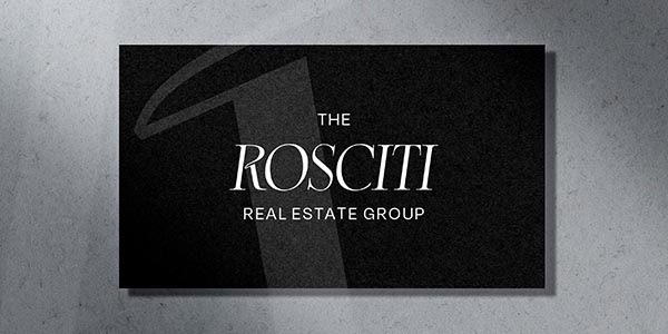 Black background with white text displaying "The Rosciti Real Estate Group.